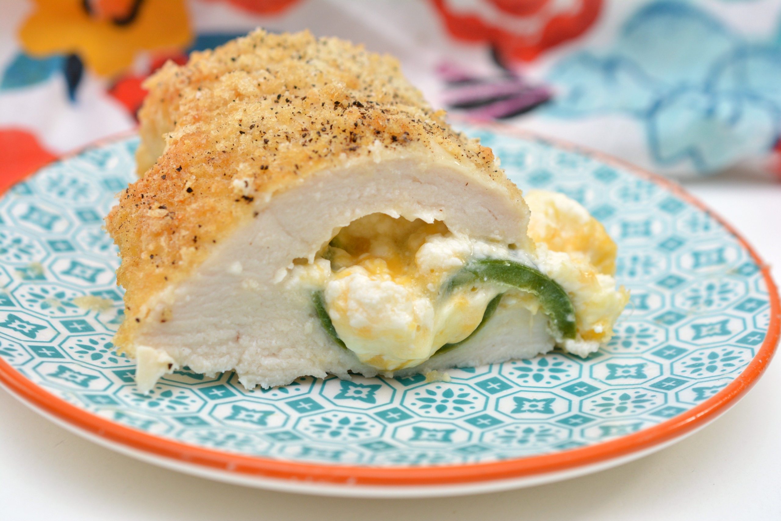 If you're a jalapeño popper lover like myself, this Keto Stuffed Jalapeño Popper Chicken will change your life. It's perfect for your Keto lifestyle! #thecraftyguru #ketorecipes #jalapenopopper #chickenrecipes