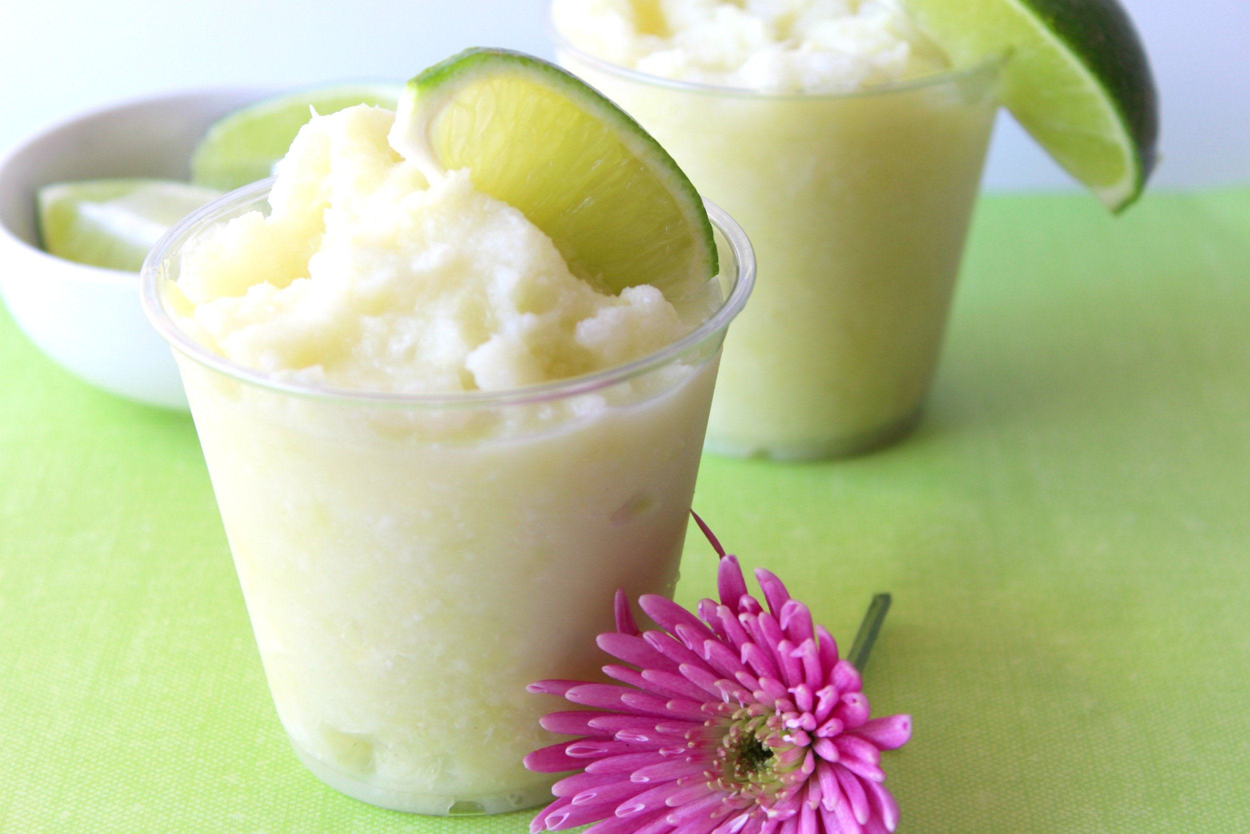 dole whip on green mat with pink flower